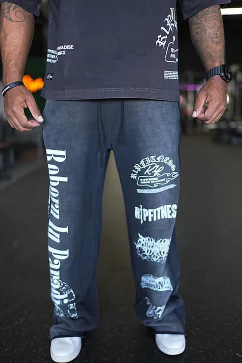 Front half view of R1PFITNESS Oversized Matching Sweatpants highlighting gourd graphic and khaki wash